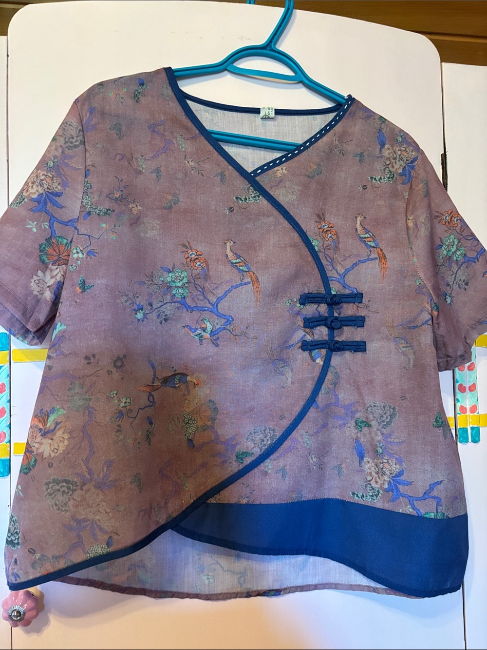 Women’s Floral Wrap-Style Short Sleeve Top in Mauve with Blue Trim
